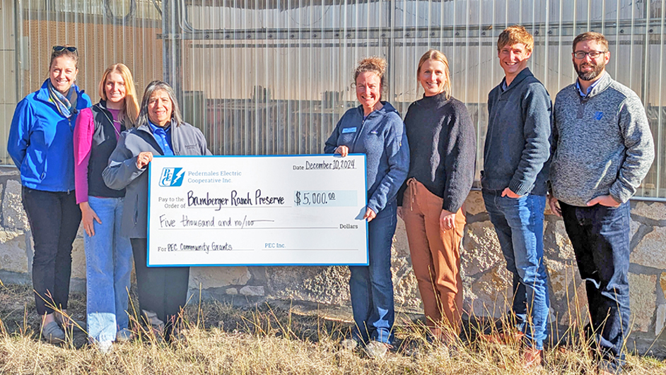 Photo of PEC employees with representatives from the Bamberger Ranch Preserve.